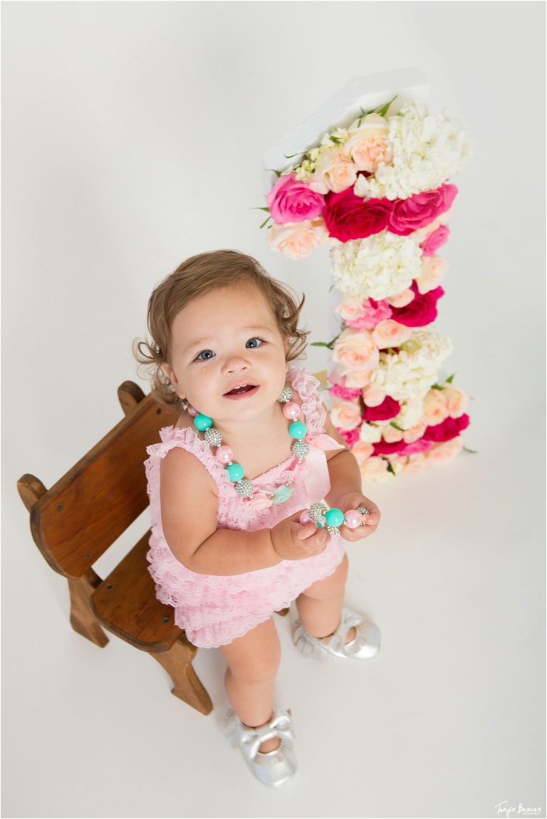 Jacksonville Newborn Photography; Jacksonville Newborn Photographer; Jacksonville Newborn Pictures; Jacksonville Newborn Photos; Tonya Beaver Photography; Flowered number one Photoshoot; first birthday photos; number one flower decoration; 
