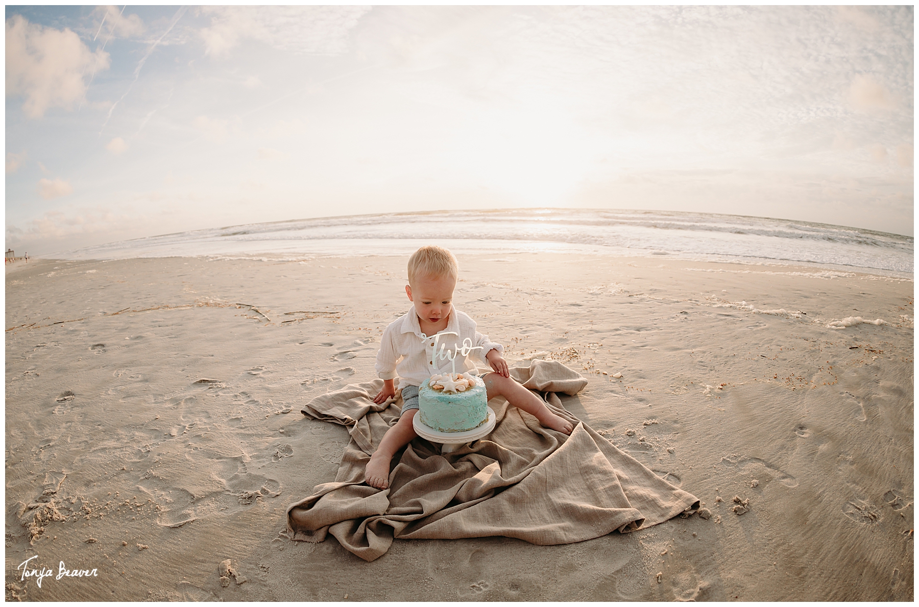 TWO YEAR BIRTHDAY CAKE SMASH ON BEACH; TWO YEAR BIRTHDAY CAKE SMASH ON BEACH PHOTOGRAPHY; TWO YEAR BIRTHDAY CAKE SMASH PHOTOS; TWO YEAR BIRTHDAY CAKE SMASH PHOTOGRAPHER; TWO YEAR BIRTHDAY CAKE SMASH PICTURES;  Milestone Photography; Smash Cake Photography; JACKSONVILLE CAKE SMASH PHOTOGRAPHY; JACKSONVILLE CAKE SMASH PHOTOGRAPHER; JACKSONVILLE CAKE SMASH PHOTOS; JACKSONVILLE CAKE SMASH PICTURES;