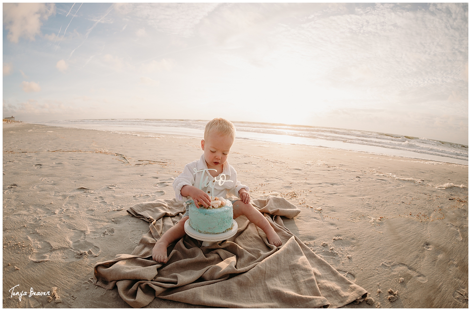 TWO YEAR BIRTHDAY CAKE SMASH ON BEACH; TWO YEAR BIRTHDAY CAKE SMASH ON BEACH PHOTOGRAPHY; TWO YEAR BIRTHDAY CAKE SMASH PHOTOS; TWO YEAR BIRTHDAY CAKE SMASH PHOTOGRAPHER; TWO YEAR BIRTHDAY CAKE SMASH PICTURES;  Milestone Photography; Smash Cake Photography; JACKSONVILLE CAKE SMASH PHOTOGRAPHY; JACKSONVILLE CAKE SMASH PHOTOGRAPHER; JACKSONVILLE CAKE SMASH PHOTOS; JACKSONVILLE CAKE SMASH PICTURES;