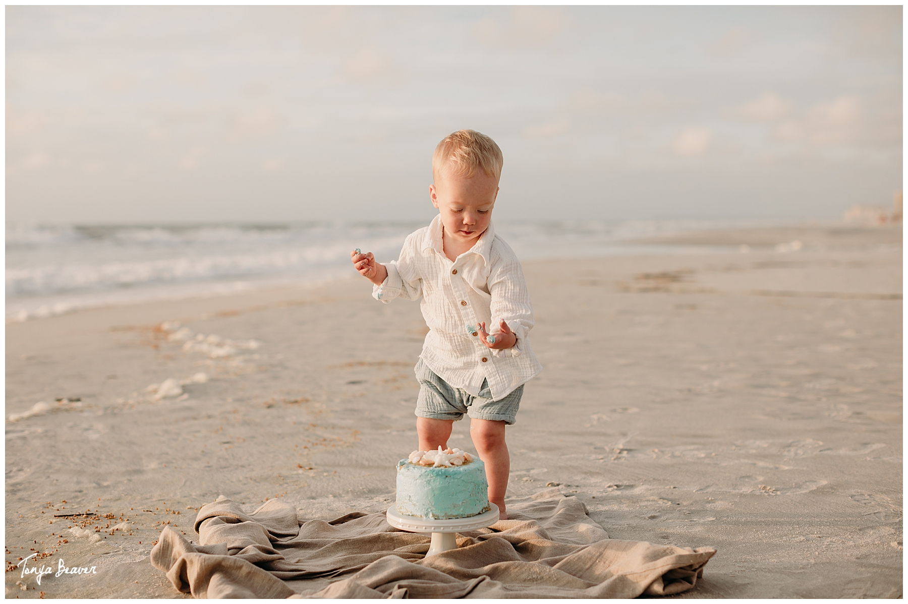 TWO YEAR BIRTHDAY CAKE SMASH ON BEACH; TWO YEAR BIRTHDAY CAKE SMASH ON BEACH PHOTOGRAPHY; TWO YEAR BIRTHDAY CAKE SMASH PHOTOS; TWO YEAR BIRTHDAY CAKE SMASH PHOTOGRAPHER; TWO YEAR BIRTHDAY CAKE SMASH PICTURES;  Milestone Photography; Smash Cake Photography; JACKSONVILLE CAKE SMASH PHOTOGRAPHY; JACKSONVILLE CAKE SMASH PHOTOGRAPHER; JACKSONVILLE CAKE SMASH PHOTOS; JACKSONVILLE CAKE SMASH PICTURES;