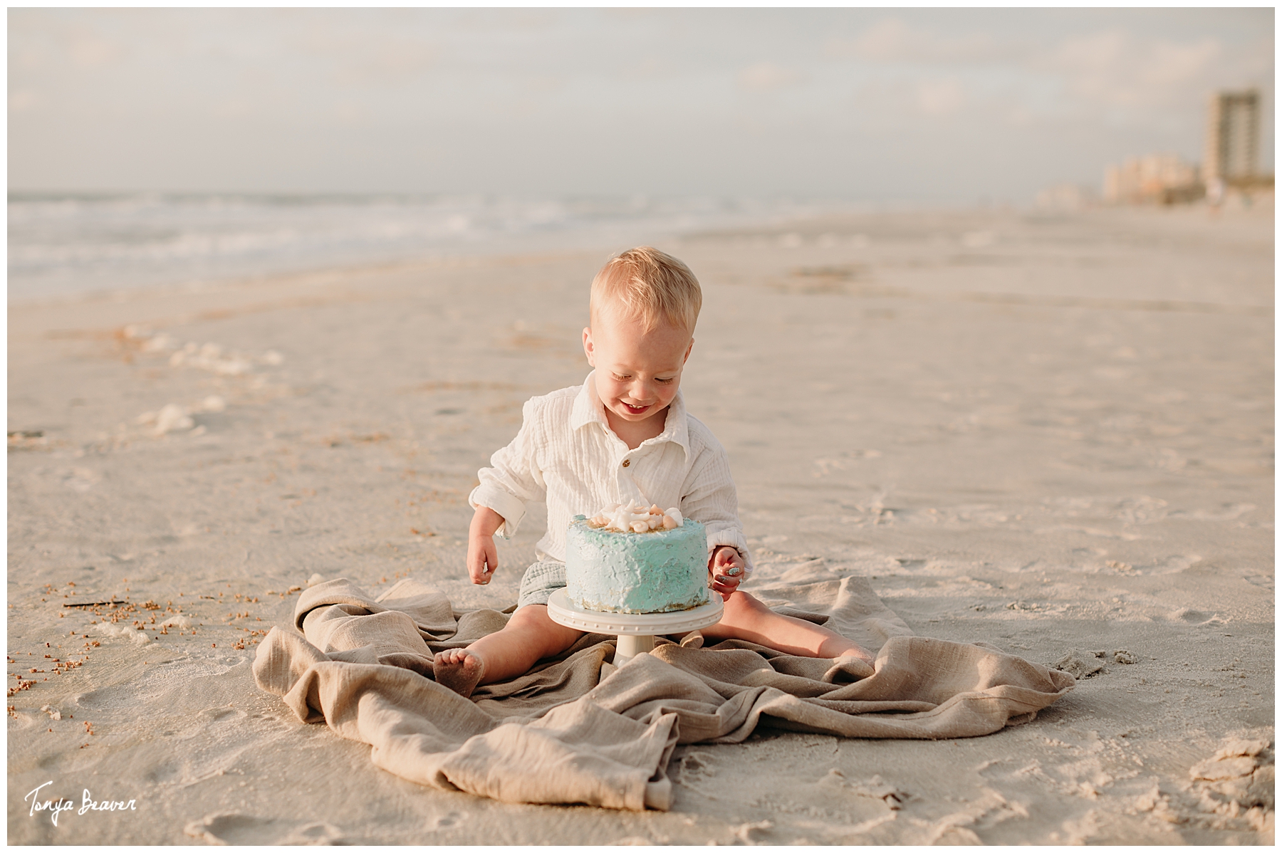 TWO YEAR BIRTHDAY CAKE SMASH ON BEACH; TWO YEAR BIRTHDAY CAKE SMASH ON BEACH PHOTOGRAPHY; TWO YEAR BIRTHDAY CAKE SMASH PHOTOS; TWO YEAR BIRTHDAY CAKE SMASH PHOTOGRAPHER; TWO YEAR BIRTHDAY CAKE SMASH PICTURES;  Milestone Photography; Smash Cake Photography; JACKSONVILLE CAKE SMASH PHOTOGRAPHY; JACKSONVILLE CAKE SMASH PHOTOGRAPHER; JACKSONVILLE CAKE SMASH PHOTOS; JACKSONVILLE CAKE SMASH PICTURES;